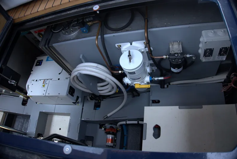 Imonna Yacht Photos Pics Engine compartment of 2024 Cranchi A46 yacht, showcasing mechanical components and wiring.
