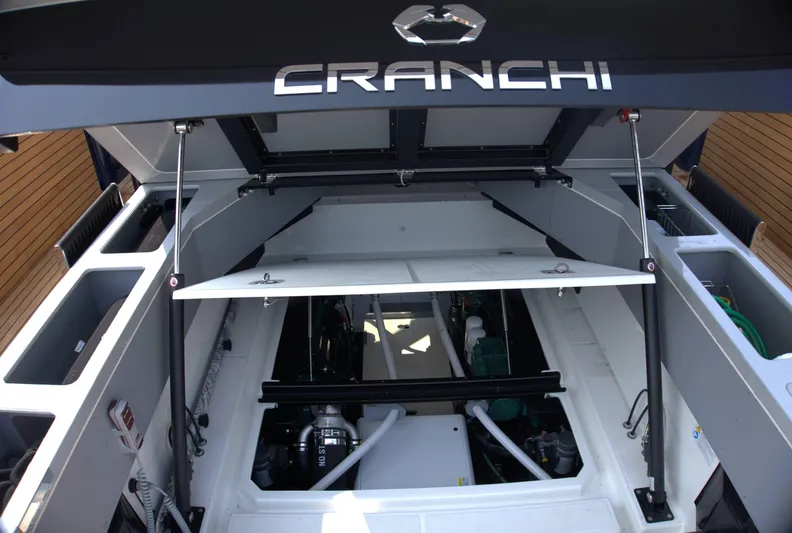 Imonna Yacht Photos Pics 2024 Cranchi A46 yacht engine compartment with open hatch, showcasing mechanical components.
