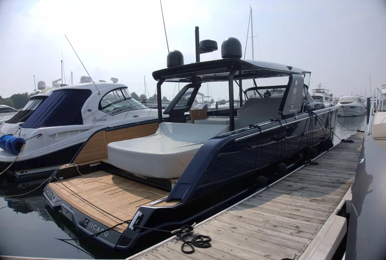 Imonna Yacht Photos Pics 2024 Cranchi A46 yacht docked at marina, showcasing sleek design and modern features.