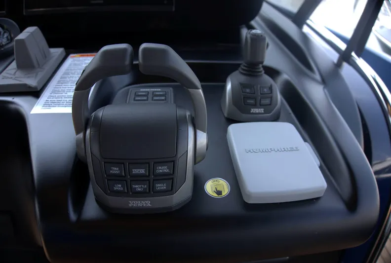 Imonna Yacht Photos Pics Control panel of 2024 Cranchi A46 yacht featuring Volvo Penta throttle and joystick.