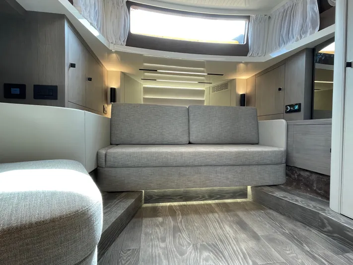 Imonna Yacht Photos Pics Modern interior of 2024 Cranchi A46 yacht with sleek design and comfortable seating.