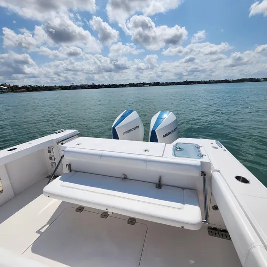  Yacht Photos Pics 2022 Southport 30 FE boat with twin Mercury engines on a sunny day.