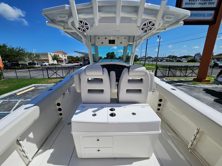 Yacht Photos Pics 2024 Sailfish 312CC center console boat interior with seating and storage.