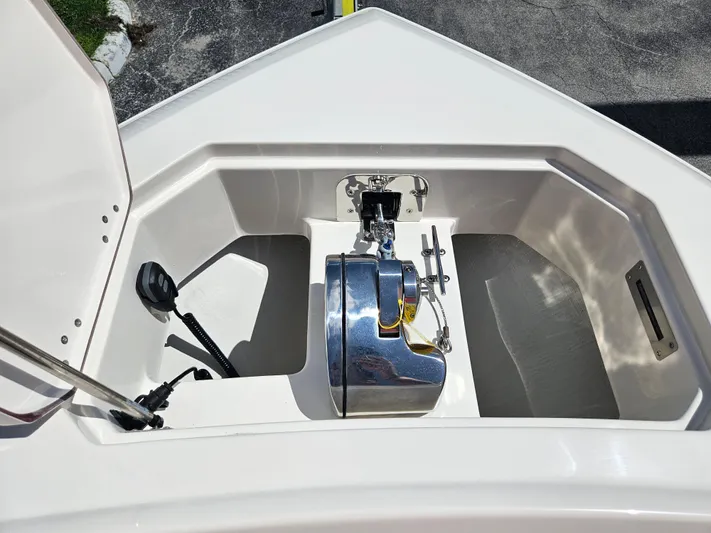  Yacht Photos Pics 2024 Sailfish 312CC boat anchor compartment with winch and storage.
