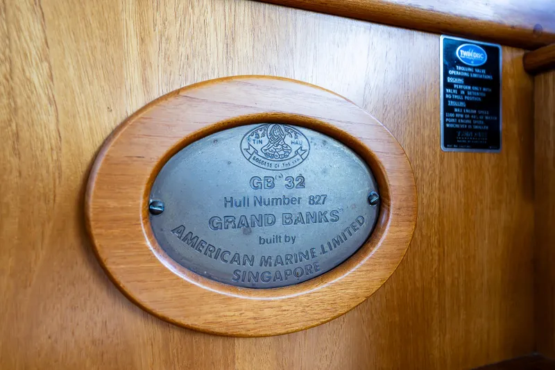 Vesper Yacht Photos Pics 1990 Grand Banks Sedan GB 32 hull plaque by American Marine Limited, Singapore.