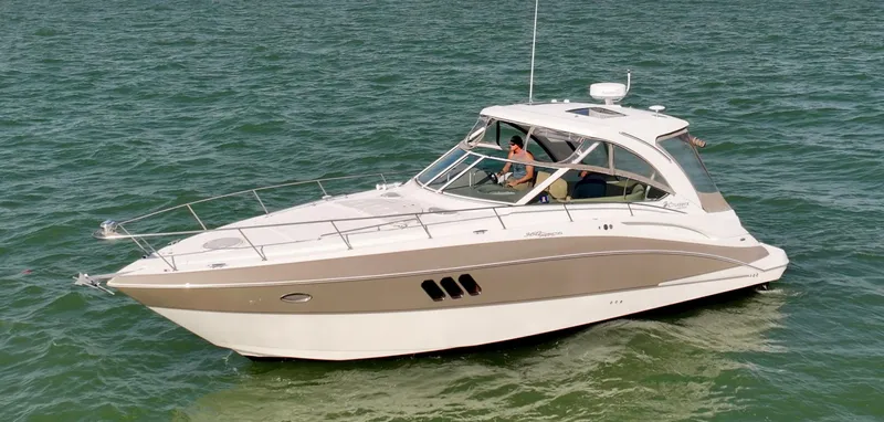 Tarpon III Yacht Photos Pics 2009 Cruisers Yachts 360 Express on open water, showcasing sleek design and luxury features.