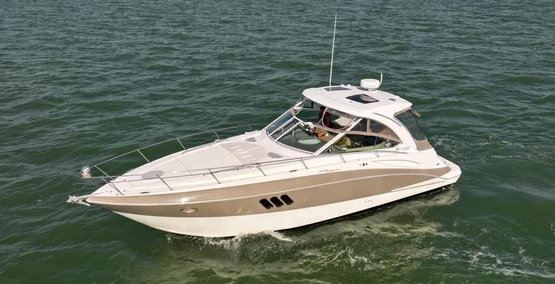 Tarpon III Yacht Photos Pics 2009 Cruisers Yachts 360 Express navigating on open water.