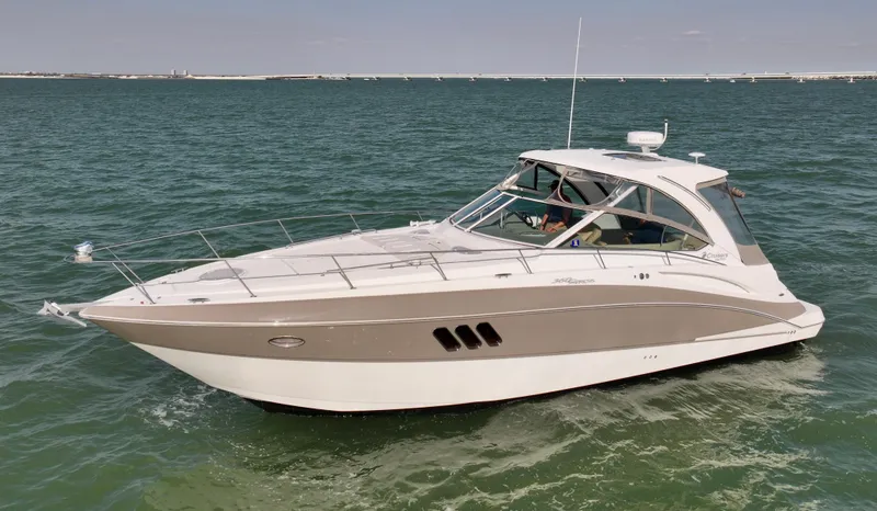 Tarpon III Yacht Photos Pics 2009 Cruisers Yachts 360 Express on open water, sleek design, luxury boating experience.