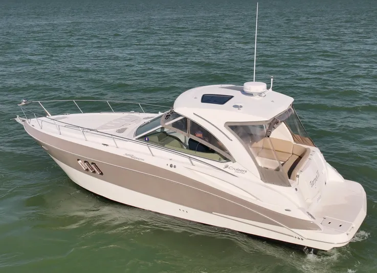 Tarpon III Yacht Photos Pics 2009 Cruisers Yachts 360 Express on open water, showcasing sleek design and luxury features.