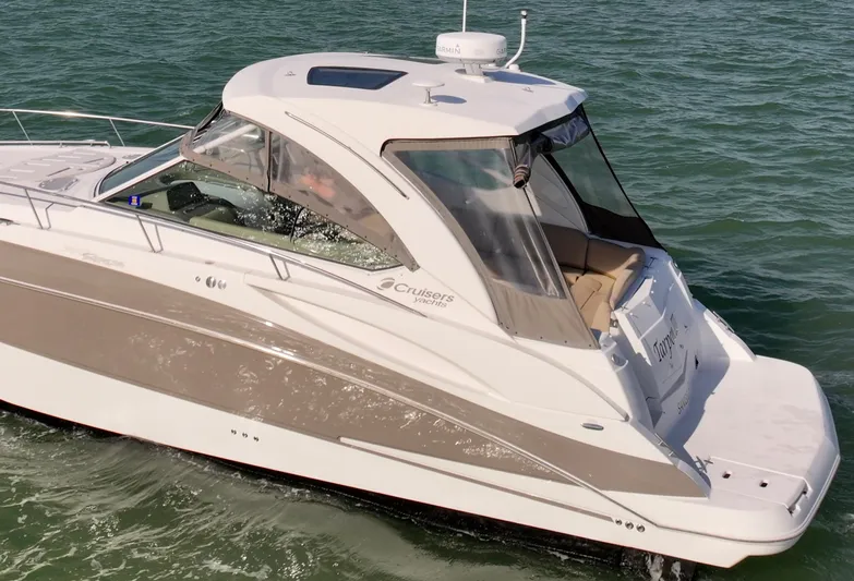 Tarpon III Yacht Photos Pics 2009 Cruisers Yachts 360 Express on water, side view, sleek design.