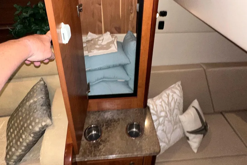 Tarpon III Yacht Photos Pics 2009 Cruisers Yachts 360 Express interior with cushions, cabinet, and countertop.