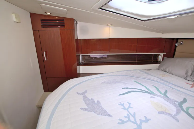 Sun Daze Yacht Photos Pics Luxurious cabin interior of 2013 Sea Ray 450 Sundancer yacht with elegant wood finishes.