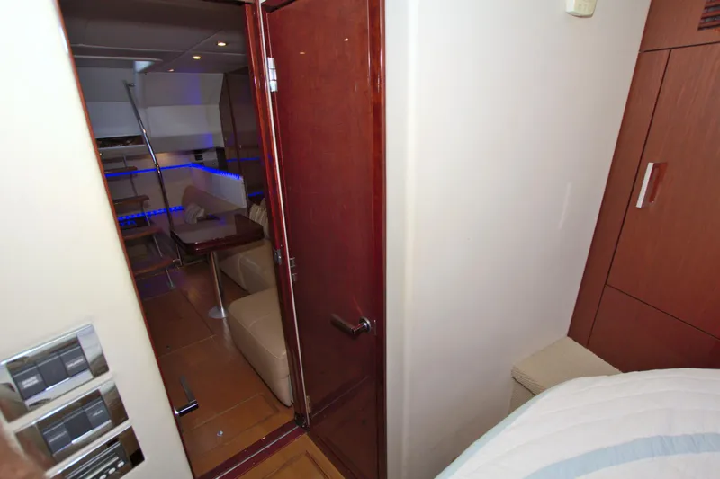 Sun Daze Yacht Photos Pics Interior view of 2013 Sea Ray 450 Sundancer yacht, featuring modern seating and ambient lighting.