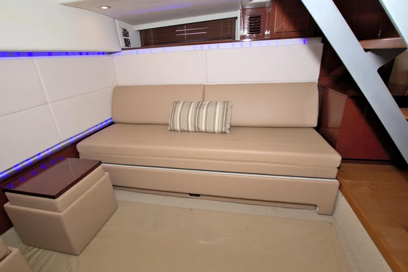 Sun Daze Yacht Photos Pics Interior of 2013 Sea Ray 450 Sundancer yacht with beige seating and modern design.