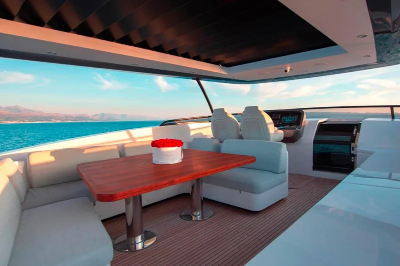  Yacht Photos Pics Luxurious 2025 Azimut Magellano 25M yacht interior with elegant seating and ocean view.