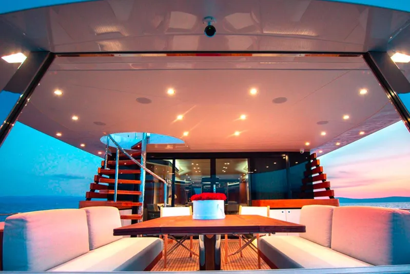  Yacht Photos Pics Luxurious Azimut Magellano 25M yacht interior, featuring elegant seating and ambient lighting, 2025 model.
