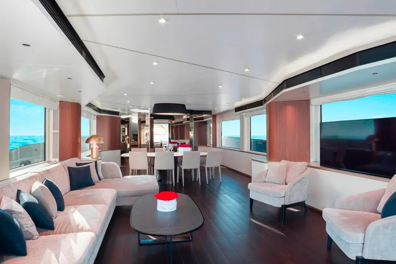  Yacht Photos Pics Luxurious interior of 2025 Azimut Magellano 25M yacht with elegant seating and dining area.