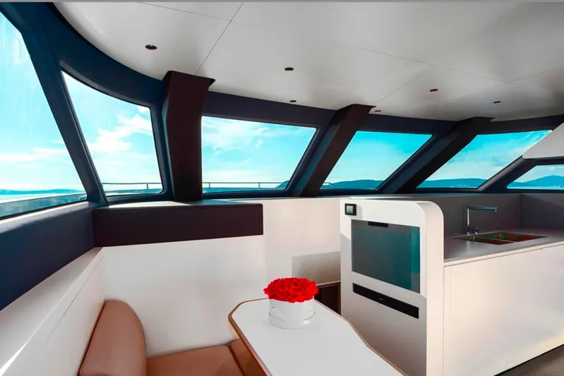  Yacht Photos Pics Luxurious interior of 2025 Azimut Magellano 25M yacht with panoramic windows and modern design.