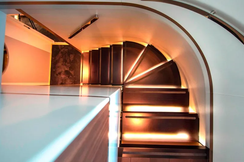  Yacht Photos Pics Spiral staircase with ambient lighting on Azimut Magellano 25M yacht, 2025 model.