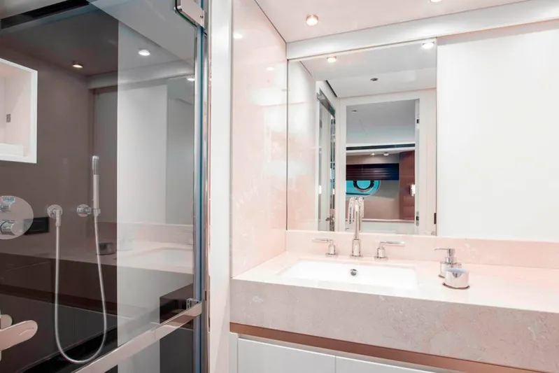  Yacht Photos Pics Luxurious bathroom in 2025 Azimut Magellano 25M yacht with modern fixtures.