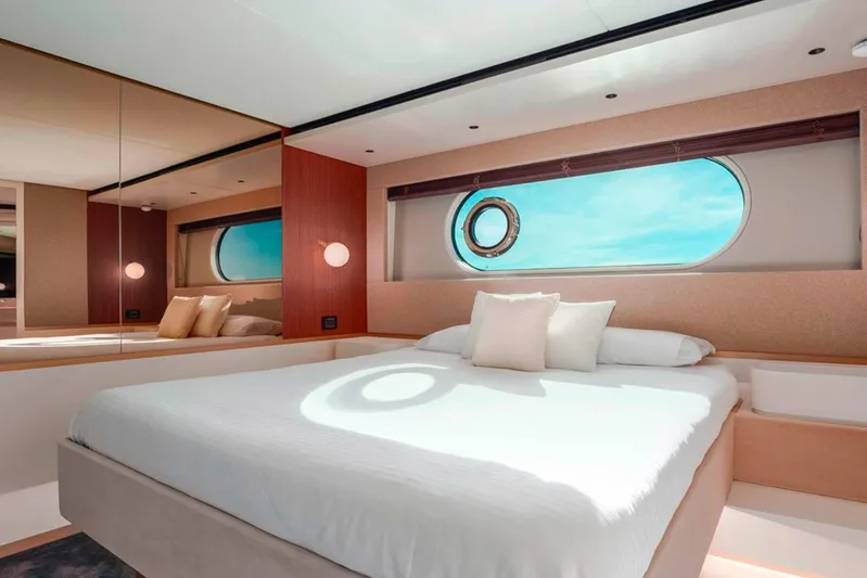  Yacht Photos Pics Luxurious bedroom interior of 2025 Azimut Magellano 25M yacht with ocean view.