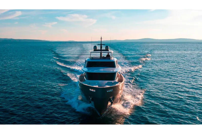  Yacht Photos Pics 2025 Azimut Magellano 25M yacht cruising on open sea at sunset.