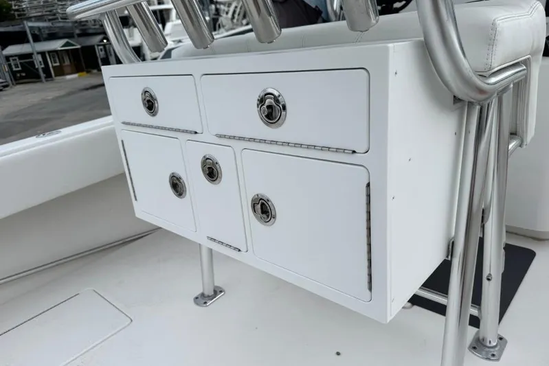  Yacht Photos Pics 2025 Contender 25 Tournament boat storage compartments with stainless steel handles.