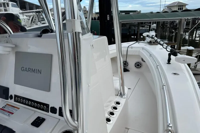  Yacht Photos Pics 2025 Contender 25 Tournament boat with Garmin navigation, docked at marina.