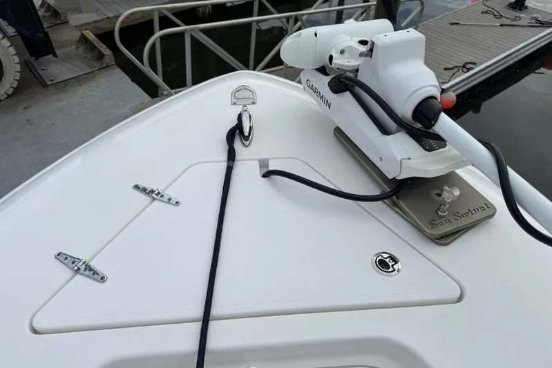  Yacht Photos Pics Bow of 2025 Contender 25 Tournament boat with Garmin equipment and dock view.