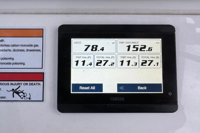  Yacht Photos Pics Yamaha display showing fuel usage and trip data on Contender 25 Tournament 2025 boat.