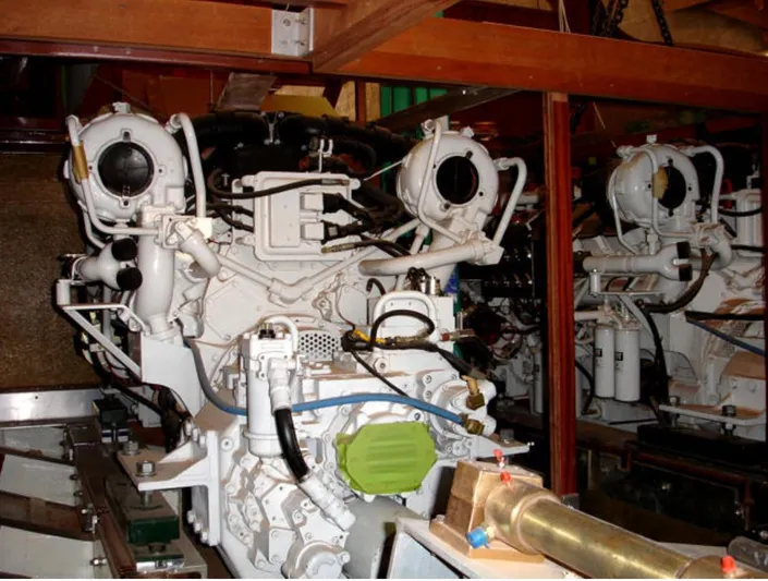 Miss Osb Yacht Photos Pics Engine room of a 2009 Hugh Saint 65 Commuter boat, showcasing complex machinery.