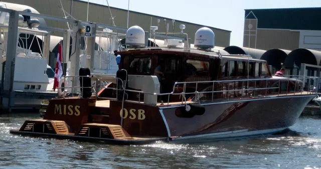 Miss Osb Yacht Photos Pics 2009 Hugh Saint 65 Commuter yacht "Miss OSB" docked at marina.