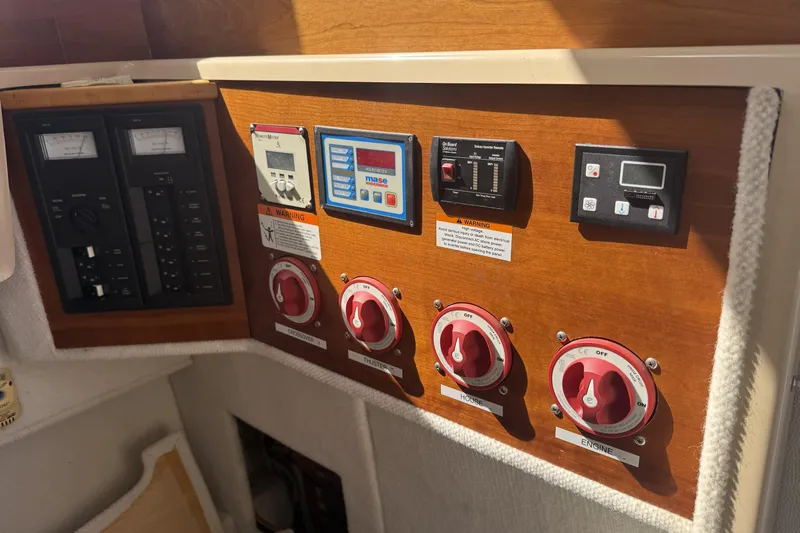  Yacht Photos Pics Control panel of a 2012 Cutwater C-28 boat with switches and meters.
