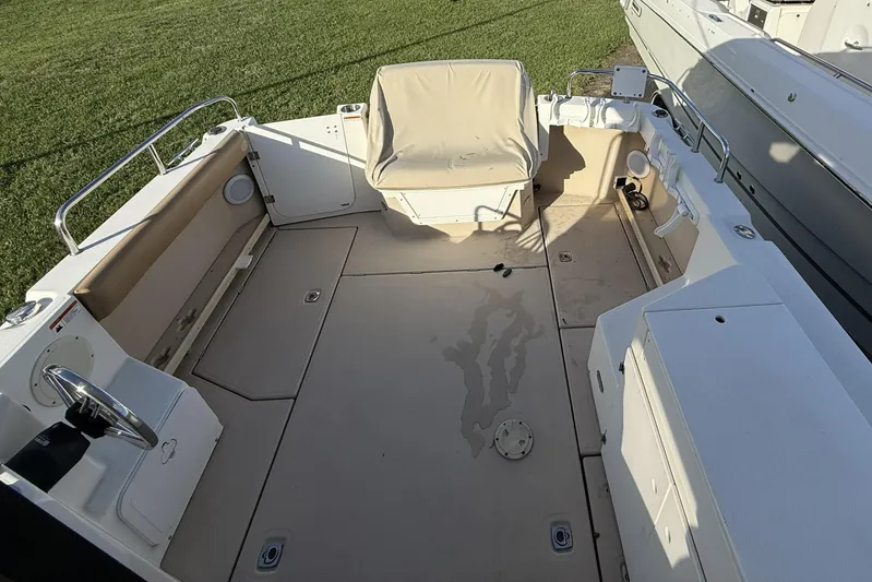  Yacht Photos Pics 2012 Cutwater C-28 boat deck with seating and storage compartments.