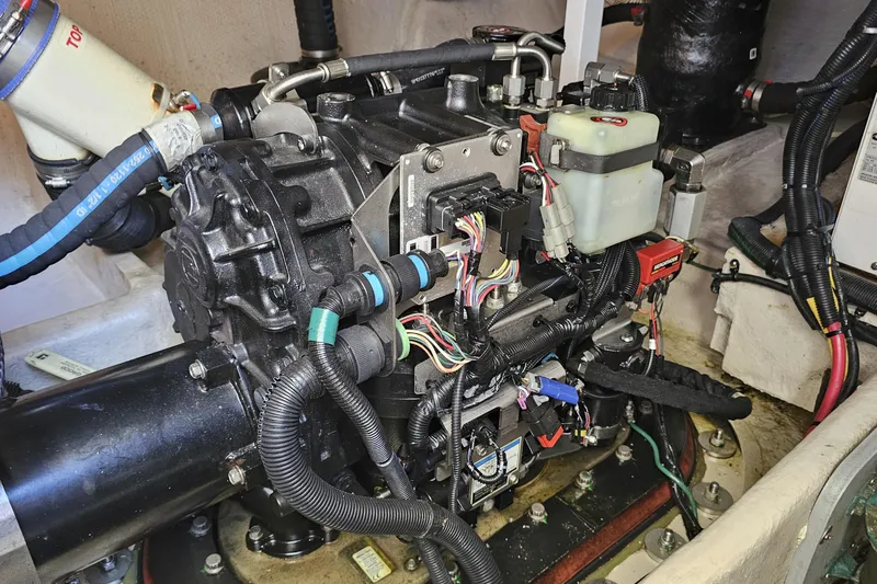  Yacht Photos Pics Engine compartment of a 2012 Meridian 441, showcasing intricate wiring and components.