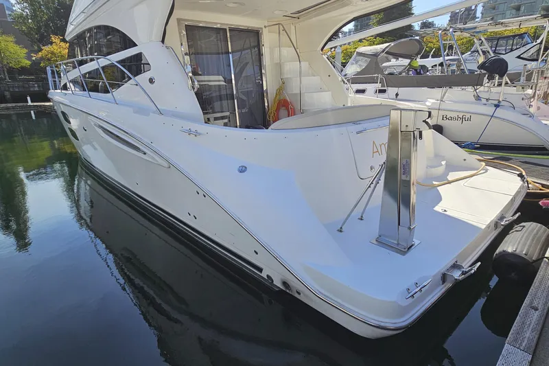  Yacht Photos Pics 2012 Meridian 441 yacht docked in marina, showcasing sleek design and modern features.