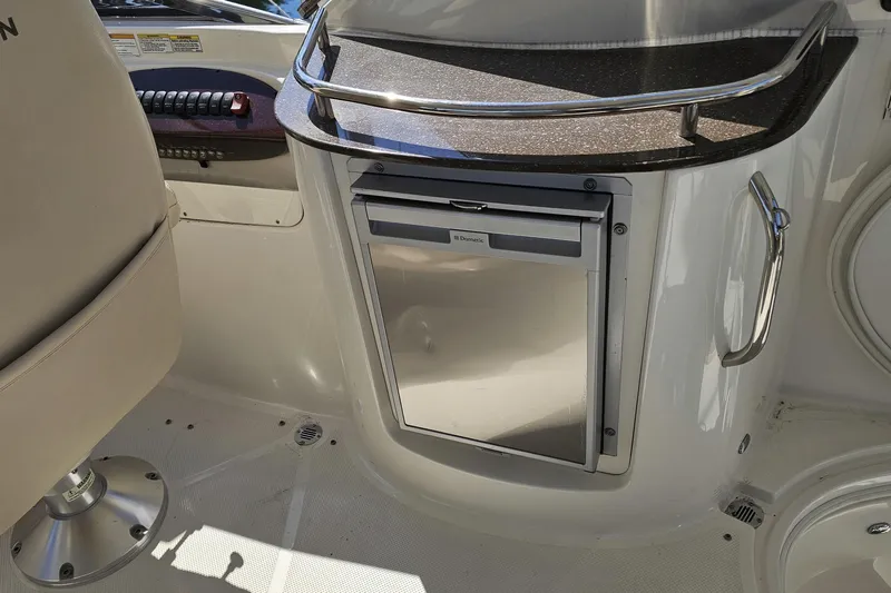  Yacht Photos Pics Interior of 2012 Meridian 441 yacht featuring a compact Dometic refrigerator.