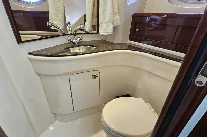  Yacht Photos Pics Luxurious bathroom in 2012 Meridian 441 yacht with modern sink and toilet.