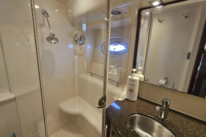  Yacht Photos Pics Luxurious bathroom in 2012 Meridian 441 yacht with shower and sink.