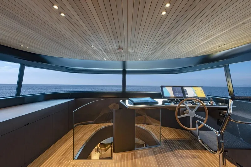  Yacht Photos Pics Modern helm station of 2022 Sanlorenzo SX 112 yacht with panoramic ocean view.