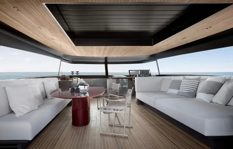  Yacht Photos Pics Luxurious interior of 2022 Sanlorenzo SX 112 yacht with modern seating and ocean view.