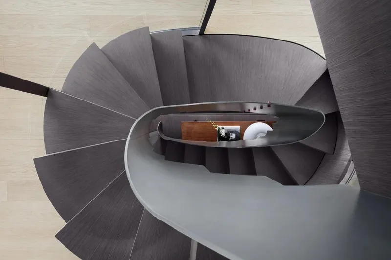  Yacht Photos Pics Modern spiral staircase on Sanlorenzo SX 112 yacht, 2022 model.