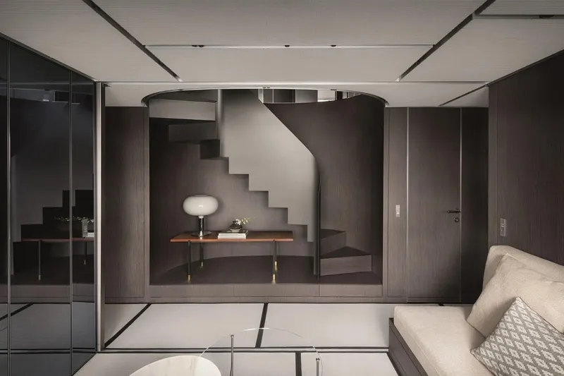  Yacht Photos Pics Modern interior of 2022 Sanlorenzo SX 112 yacht with sleek staircase and contemporary decor.