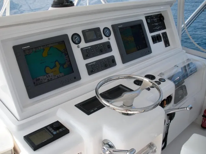  Yacht Photos Pics Bertram 510 yacht helm with navigation screens and controls, 2005 model.