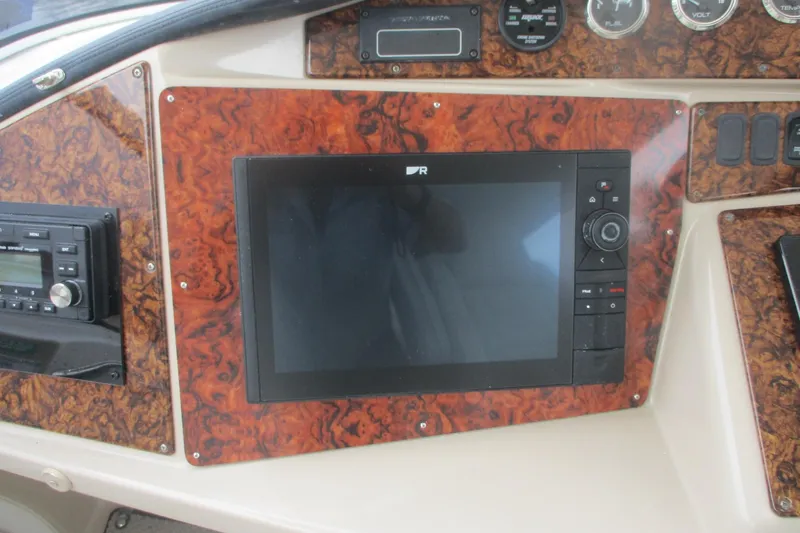  Yacht Photos Pics Dashboard of 2006 Carver 466 Motor Yacht with navigation and control systems.