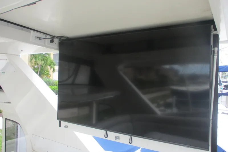  Yacht Photos Pics Flat-screen TV on 2006 Carver 466 Motor Yacht, mounted in outdoor area.