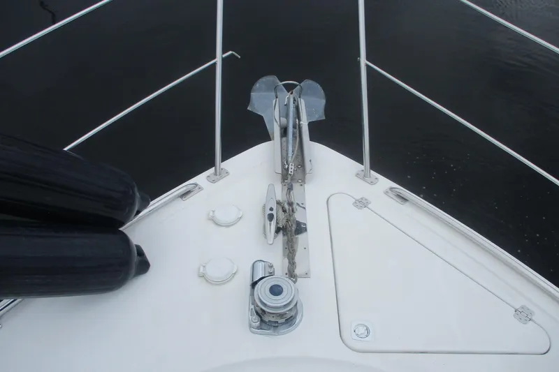  Yacht Photos Pics Bow of 2006 Carver 466 Motor Yacht with anchor and railing.