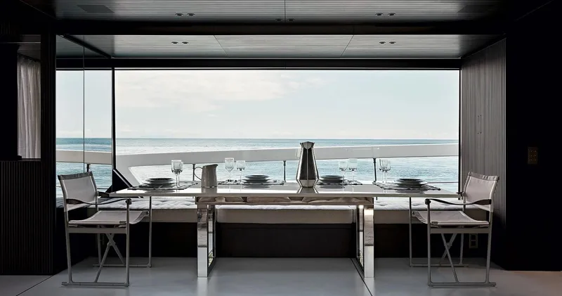  Yacht Photos Pics Luxurious dining area on the 2022 Sanlorenzo SX 88 yacht with ocean view.
