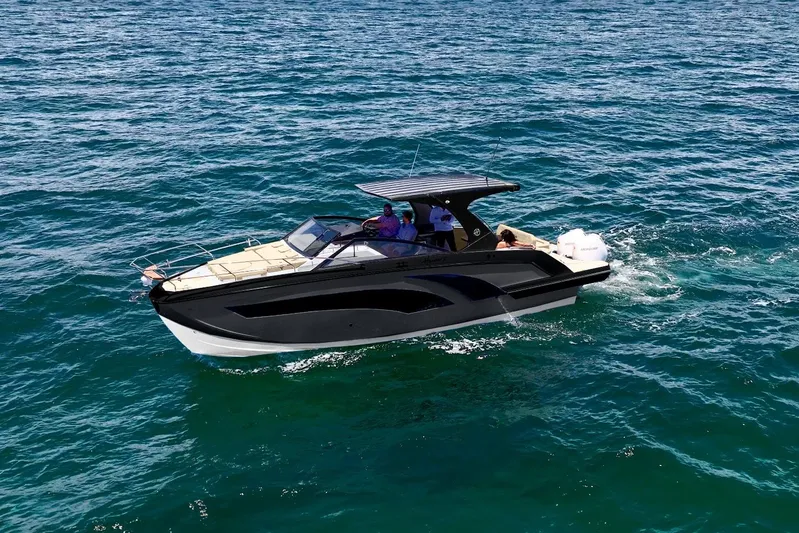  Yacht Photos Pics 2026 Hanover 347 Gray & Black Edition boat cruising on open water.