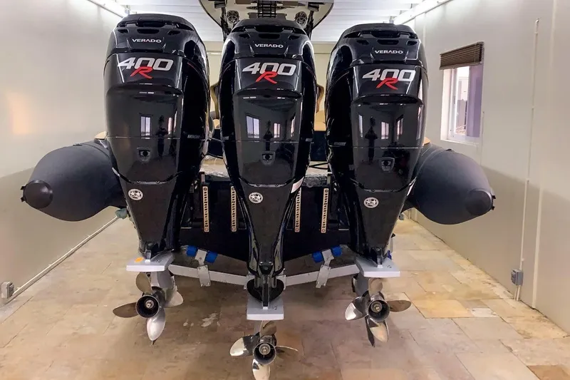  Yacht Photos Pics Triple Mercury Verado 400R engines on a 2018 Bernico RX 10 boat in a garage.